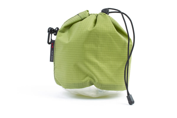 A Medium, clear-bottom Yarn Stuff Sack in Moss (green with light green grid) 210 Cerylon.